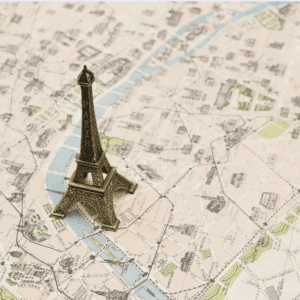 Miniature Eiffel Tower on Paris map
