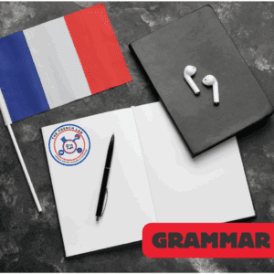French flag, notebook, pen, earbuds, Grammar Lab